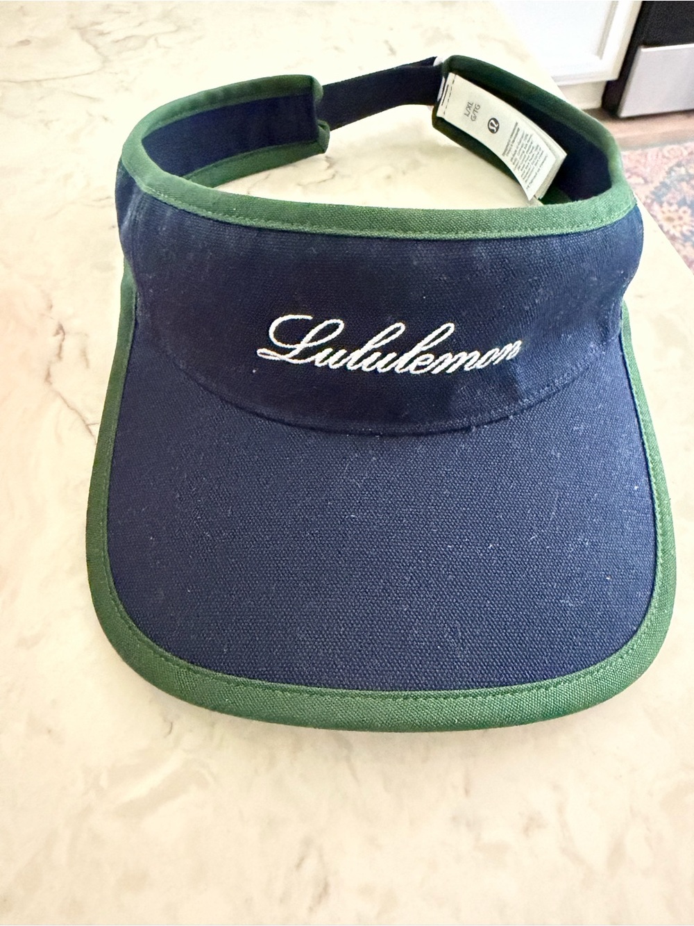 lululemon adjustable Navy Visor with Green Trim
